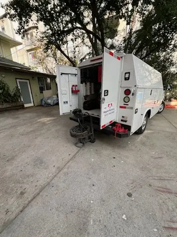 Magnet Plumbing service vehicle on-site for Water Heater Repair in Fisher Island